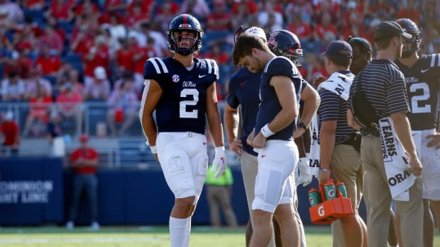 Mississippi Rebels quarterback Jaxson Dart (2) looks at the jumbotron during a review in the second half against the Tulsa Golden Hurricane at Vaught-Hemingway Stadium.
